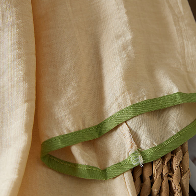 Koszula z bawełny lnianej z haftem w kwiaty w stylu casual dla kobiet zapinana na guziki żaby i kołnierzykiem skośnym - image 9