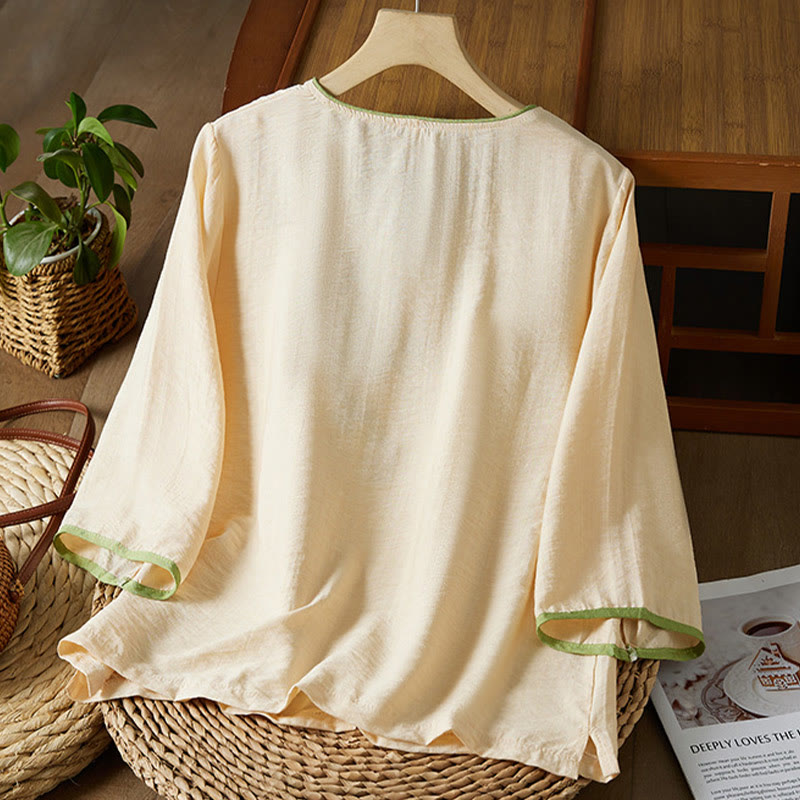 Koszula z bawełny lnianej z haftem w kwiaty w stylu casual dla kobiet zapinana na guziki żaby i kołnierzykiem skośnym - image 7