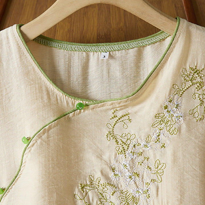 Koszula z bawełny lnianej z haftem w kwiaty w stylu casual dla kobiet zapinana na guziki żaby i kołnierzykiem skośnym - image 8