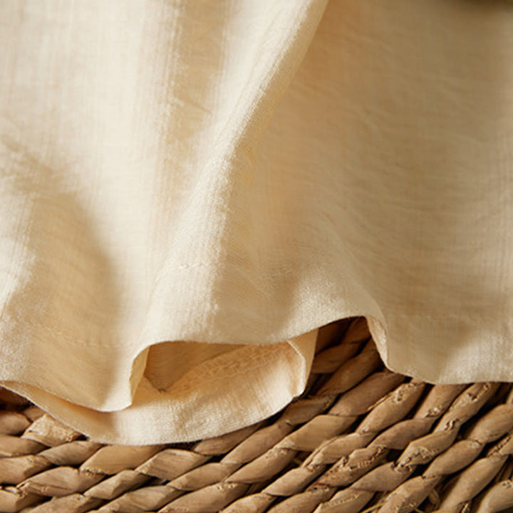 Koszula z bawełny lnianej z haftem w kwiaty w stylu casual dla kobiet zapinana na guziki żaby i kołnierzykiem skośnym - image 10