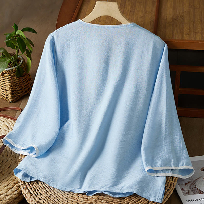 Koszula z bawełny lnianej z haftem w kwiaty w stylu casual dla kobiet zapinana na guziki żaby i kołnierzykiem skośnym - image 13