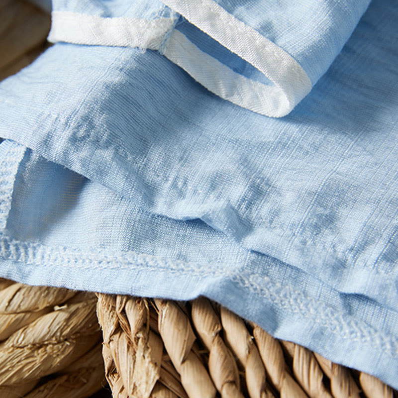 Koszula z bawełny lnianej z haftem w kwiaty w stylu casual dla kobiet zapinana na guziki żaby i kołnierzykiem skośnym - image 15