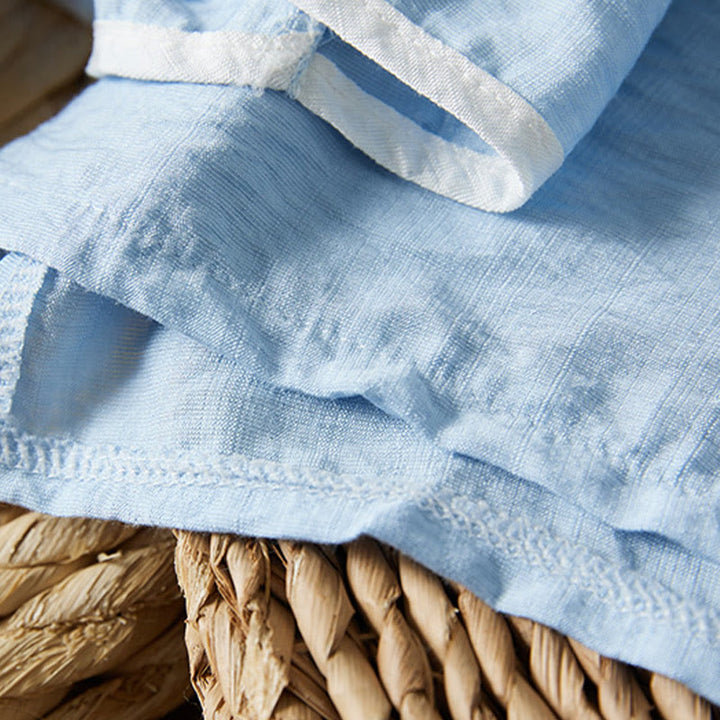 Koszula z bawełny lnianej z haftem w kwiaty w stylu casual dla kobiet zapinana na guziki żaby i kołnierzykiem skośnym - image 15