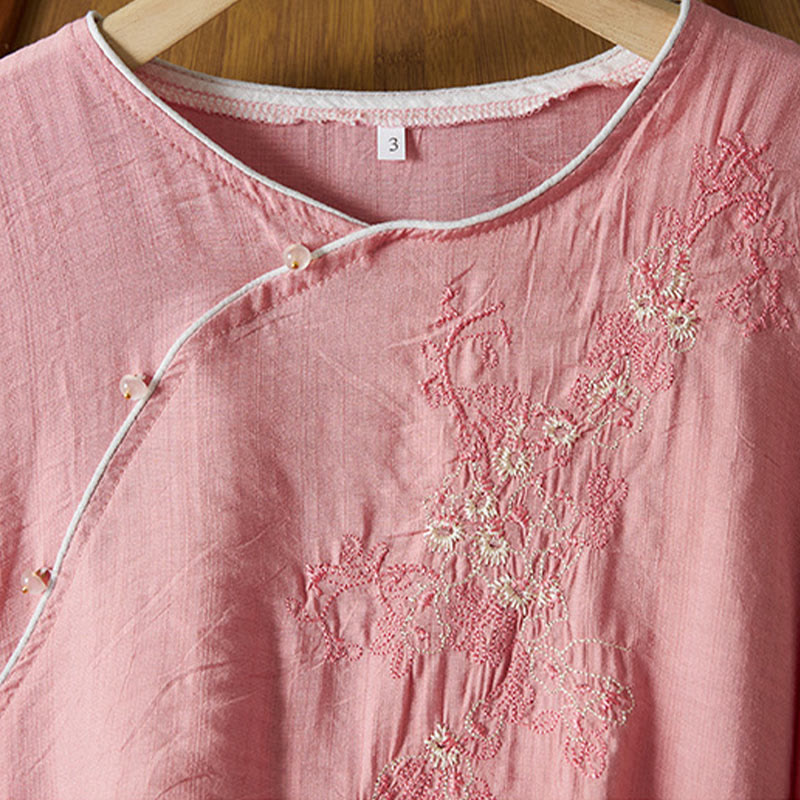 Koszula z bawełny lnianej z haftem w kwiaty w stylu casual dla kobiet zapinana na guziki żaby i kołnierzykiem skośnym - image 21