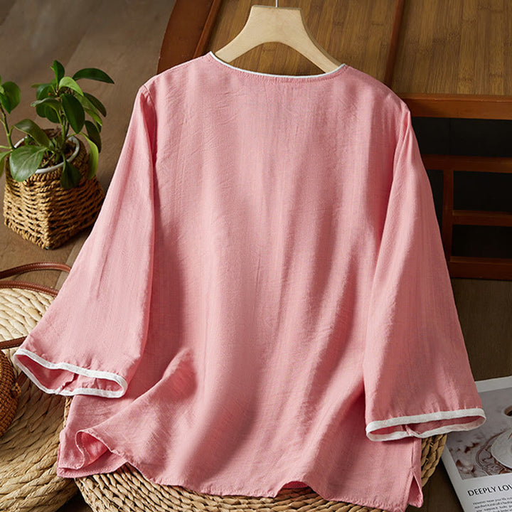 Koszula z bawełny lnianej z haftem w kwiaty w stylu casual dla kobiet zapinana na guziki żaby i kołnierzykiem skośnym - image 19