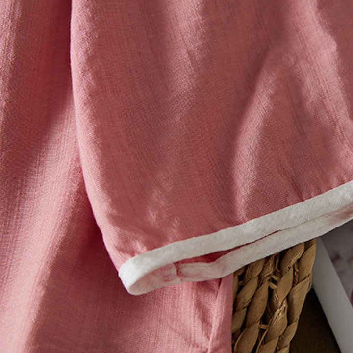 Koszula z bawełny lnianej z haftem w kwiaty w stylu casual dla kobiet zapinana na guziki żaby i kołnierzykiem skośnym - image 22