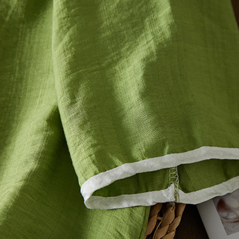 Koszula z bawełny lnianej z haftem w kwiaty w stylu casual dla kobiet zapinana na guziki żaby i kołnierzykiem skośnym - image 28