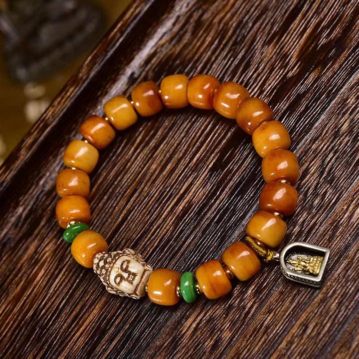 Buddha Stones Naturalne Tybetańskie Koraliki z Kości Wielbłąda Głowa Buddy Ochrona Szczęścia Bransoletka