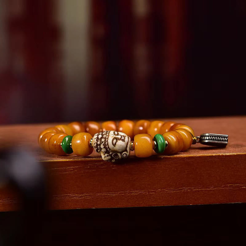 Buddha Stones Naturalne Tybetańskie Koraliki z Kości Wielbłąda Głowa Buddy Ochrona Szczęścia Bransoletka