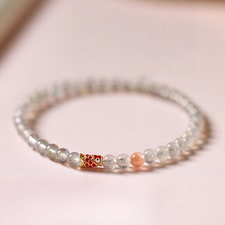 Bransoletka lecznicza z Buddha Stones Ultra-cienki kamień księżycowy Koi Fish
