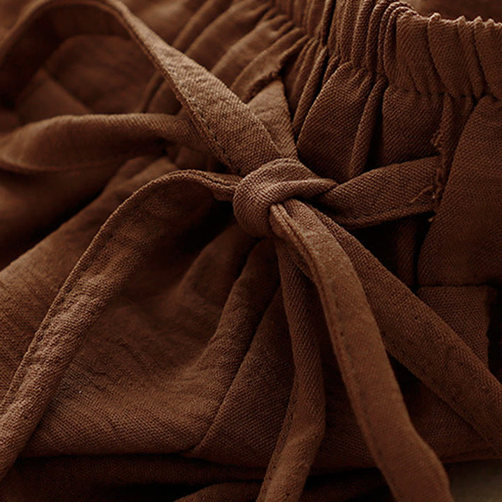 Spodnie damskie z szerokimi nogawkami i kieszeniami, w stylu casualowym i etnicznym, ze ściągaczem i prostym wzorem "Buddha Stones" - image 3