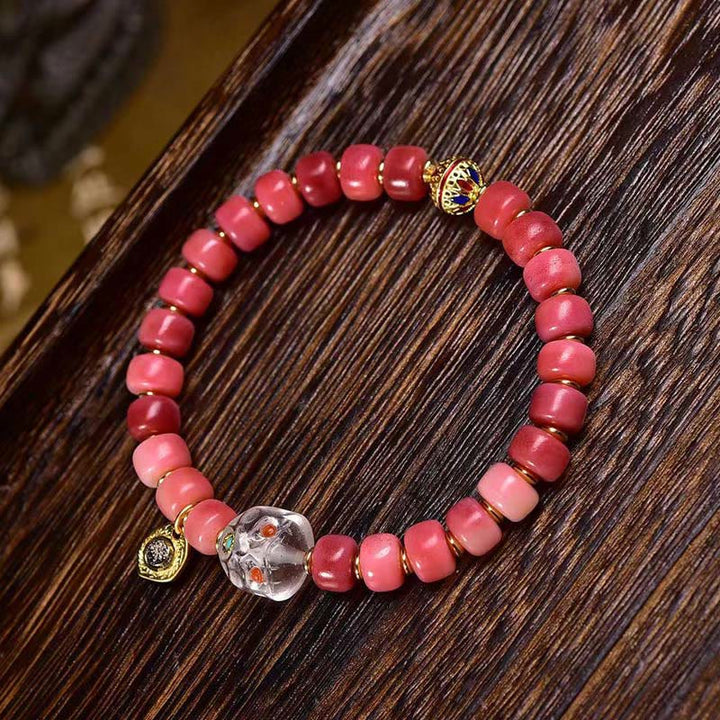 Bransoletka szczęścia z Buddha Stones buddyjskich z kości wielbłąda i miedzi z czerwonego agatu