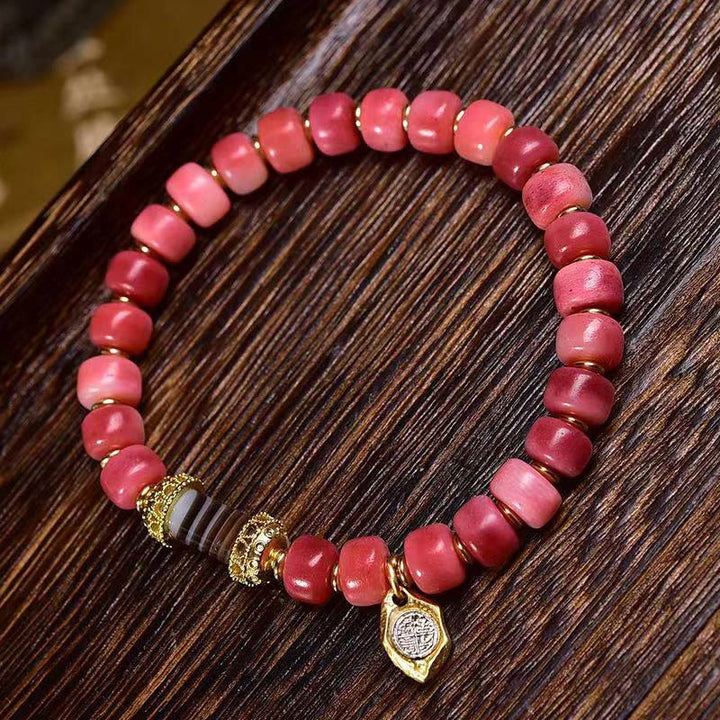 Bransoletka szczęścia z Buddha Stones buddyjskich z kości wielbłąda i miedzi z czerwonego agatu