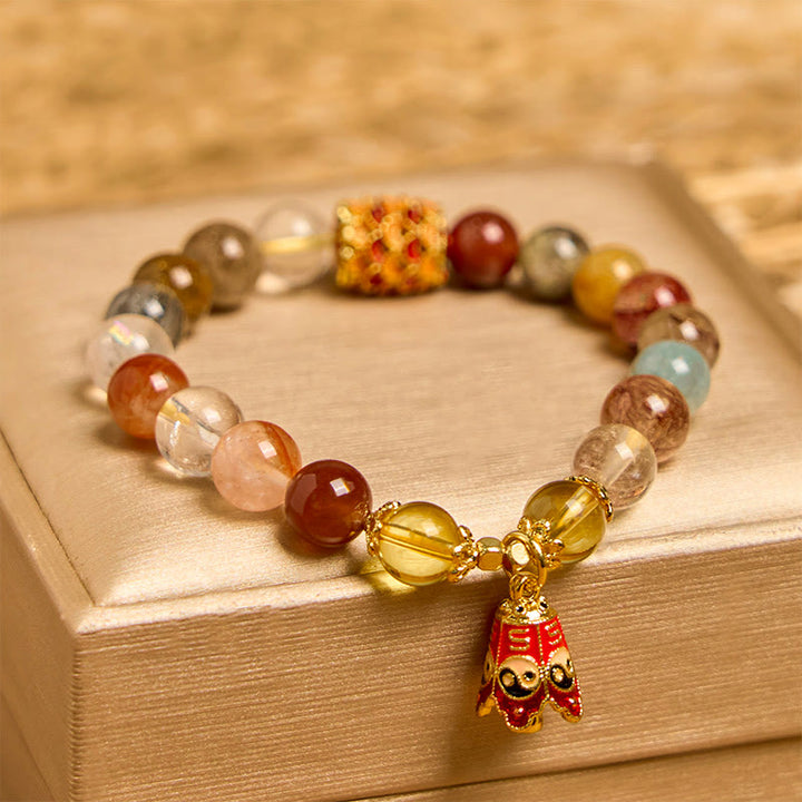 Bransoletka ochronna Yin Yang z naturalnego, kolorowego kwarcu rutylowego z Buddha Stones