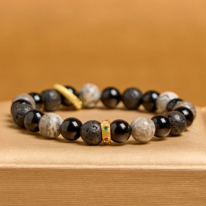 Bransoletka lecznicza z Buddha Stones , lawą i czarnym onyksem Picasso Jasper
