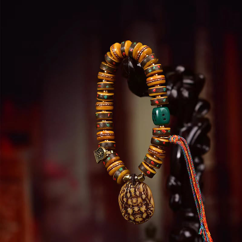 Bransoletka ochronna z frędzlami z kości wielbłąda i Buddha Stones