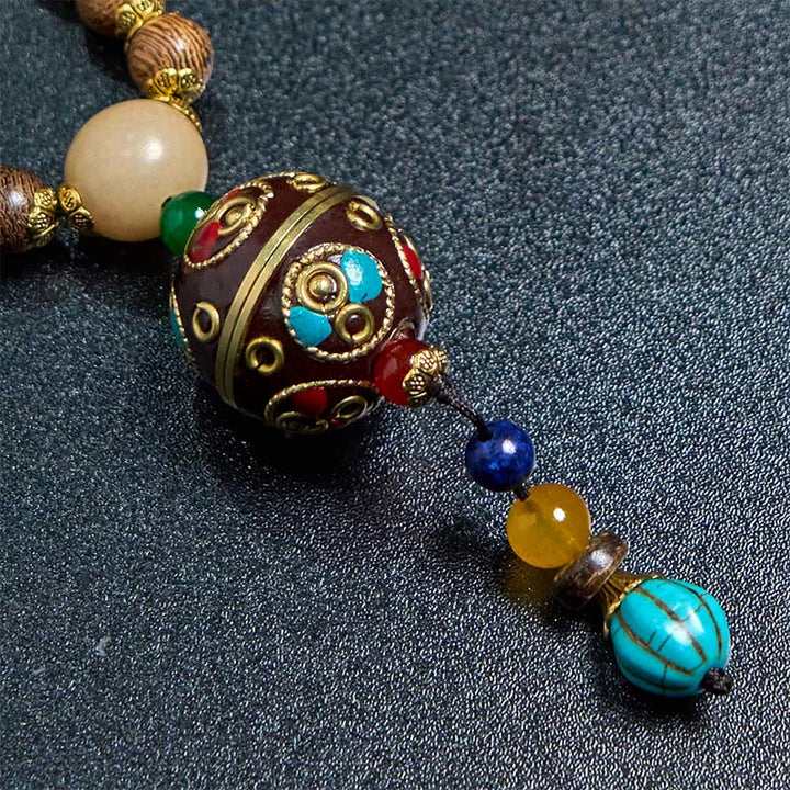 Buddha Stones Tybetańskie Ręcznie Robione Skorupki Kokosa Schima Drewno Wielki Jasny Mantra Miedziany Koralik Równowaga Naszyjnik Wisiorek