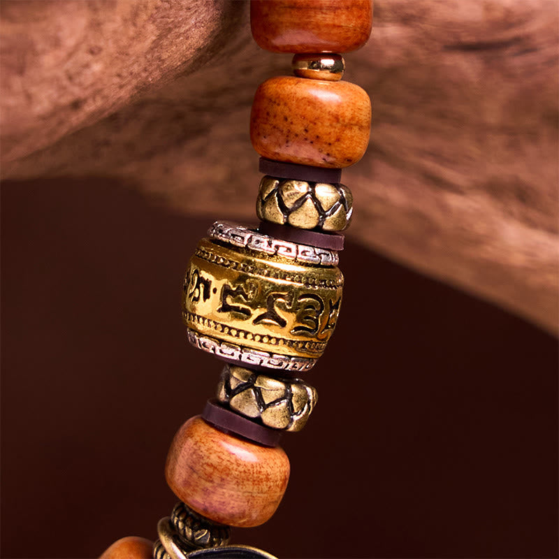 Buddha Stones Naturalne Tybetańskie Koraliki z Kości Wielbłąda OM Sanskrit Ochrona Szczęścia Bransoletka
