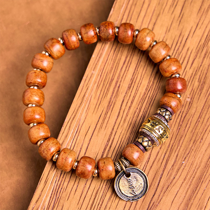 Buddha Stones Naturalne Tybetańskie Koraliki z Kości Wielbłąda OM Sanskrit Ochrona Szczęścia Bransoletka