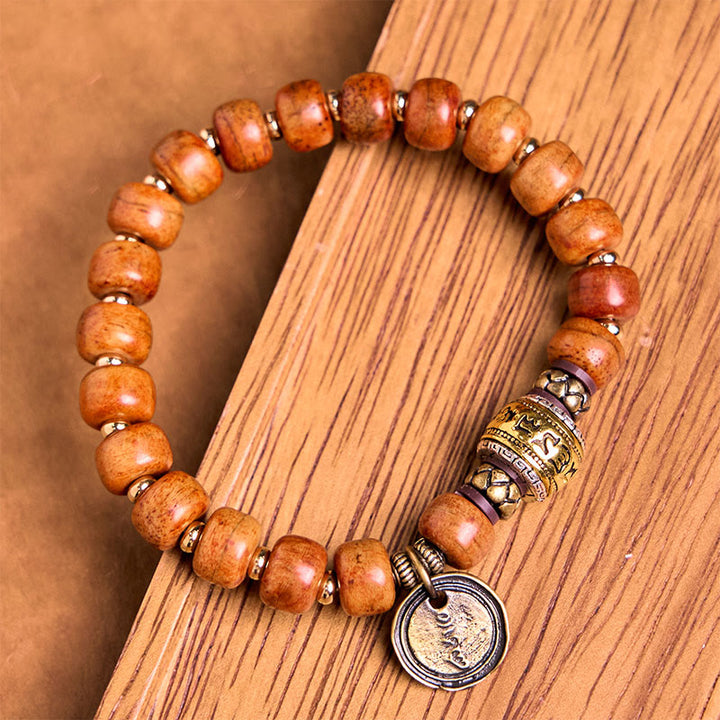 Buddha Stones Naturalne Tybetańskie Koraliki z Kości Wielbłąda OM Sanskrit Ochrona Szczęścia Bransoletka