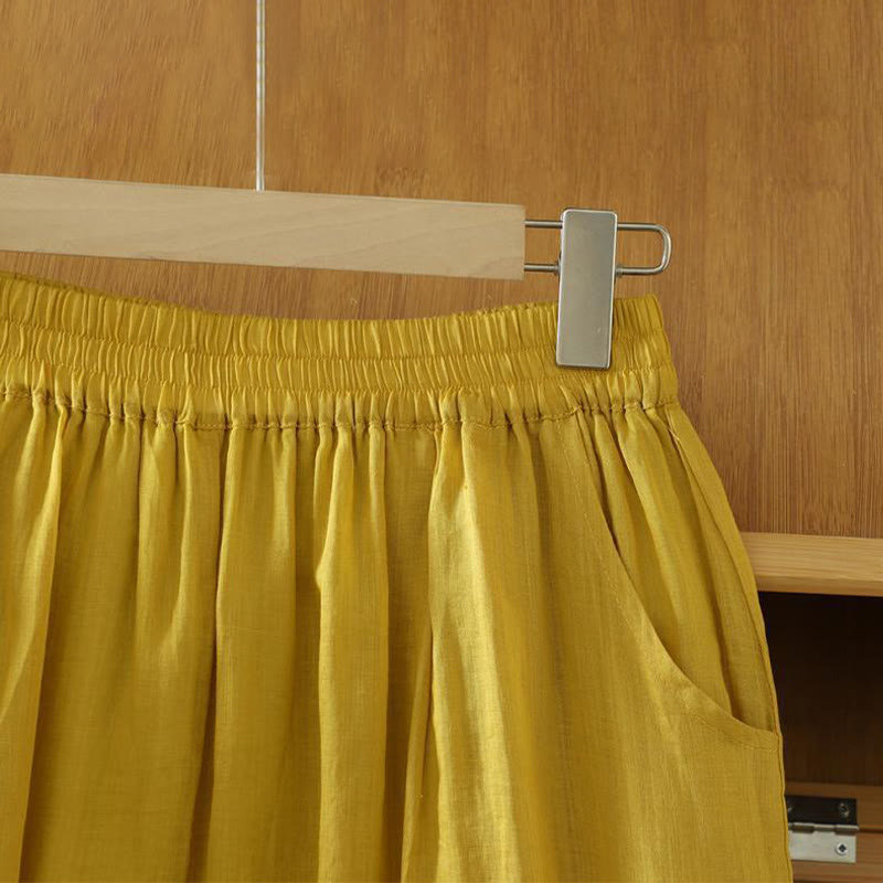 Damskie spodnie haremowe do kostek z kieszeniami w kolorze czystego koloru i prostym wzornictwem z Buddha Stones Commute - image 2