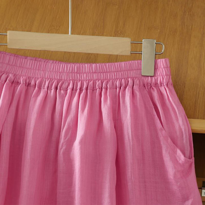 Damskie spodnie haremowe do kostek z kieszeniami w kolorze czystego koloru i prostym wzornictwem z Buddha Stones Commute - image 17