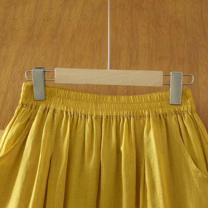 Damskie spodnie haremowe do kostek z kieszeniami w kolorze czystego koloru i prostym wzornictwem z Buddha Stones Commute - image 1