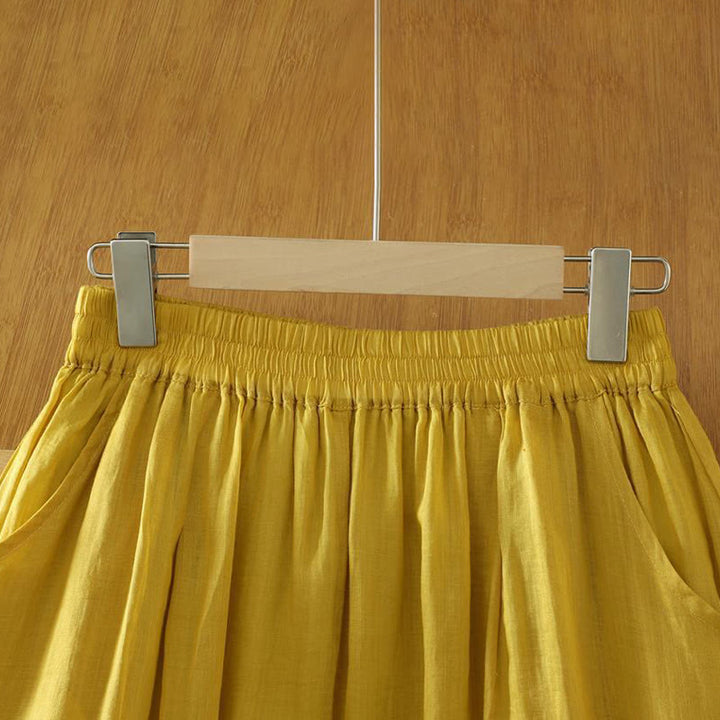 Damskie spodnie haremowe do kostek z kieszeniami w kolorze czystego koloru i prostym wzornictwem z Buddha Stones Commute - image 1