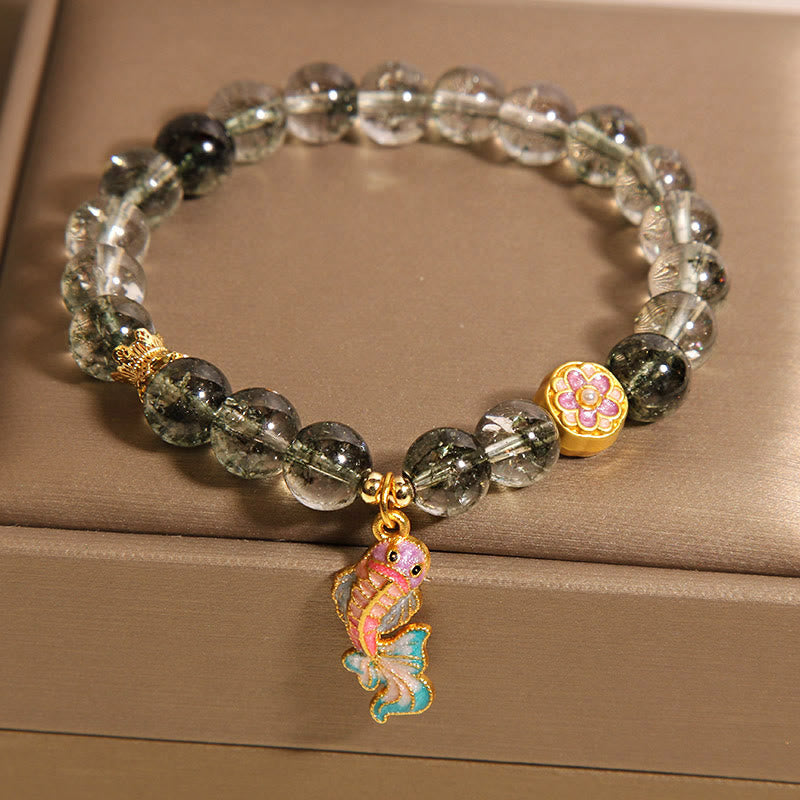 Bransoletka na szczęście z zielonymi Buddha Stones i rybką Koi Phantom