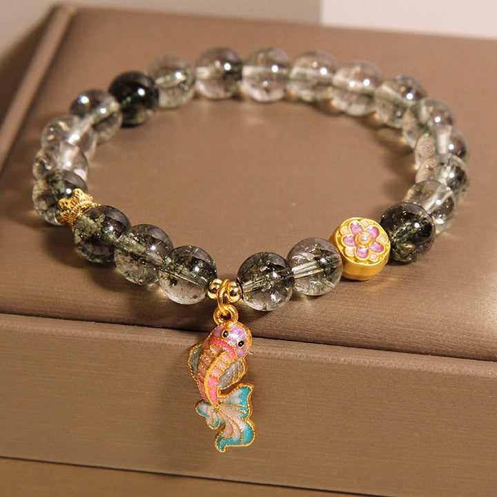 Bransoletka na szczęście z zielonymi Buddha Stones i rybką Koi Phantom