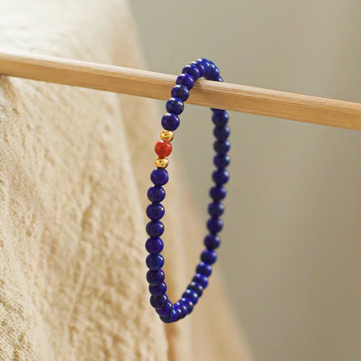 Bransoletka z Buddha Stones, małych lazurytów, lapis lazuli, cynobru, ultracienkich koralików - image 1