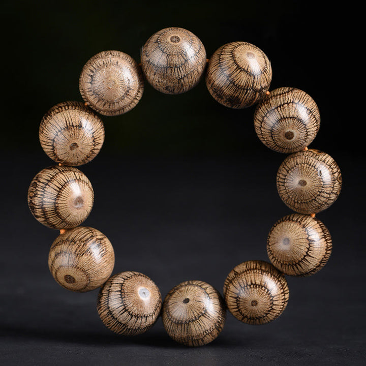 Bransoletka ochronna z koralików z drewna Gnetum z Buddha Stones - 20mm (obwód nadgarstka 14-17cm) - image 1