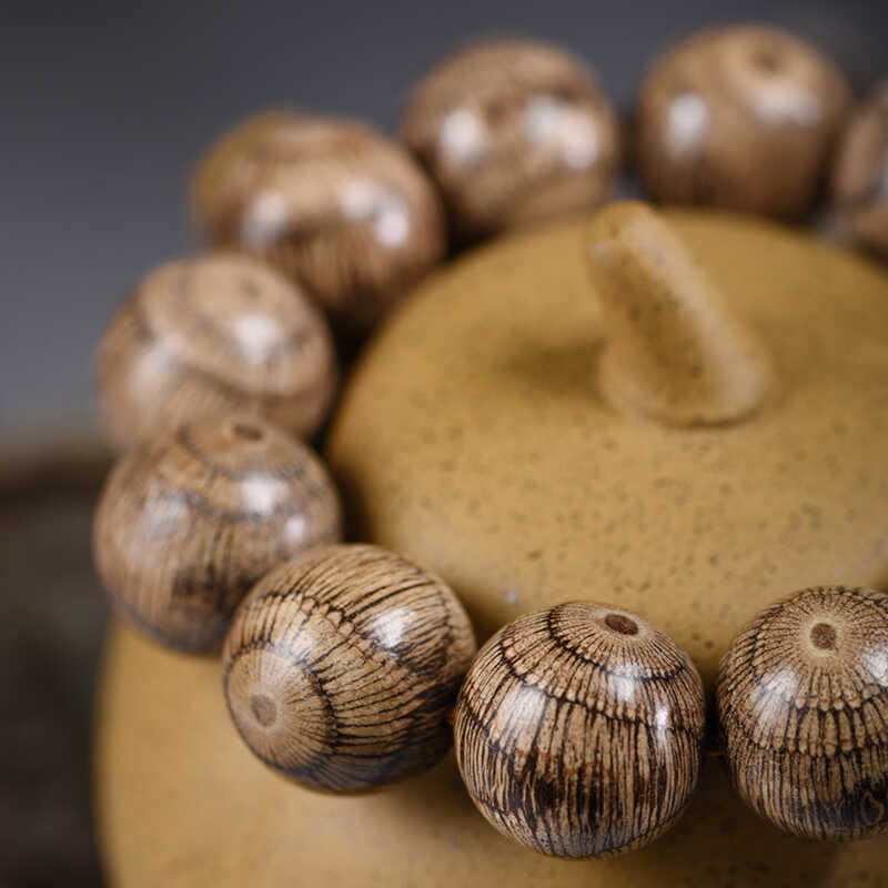 Bransoletka ochronna z koralików z drewna Gnetum z Buddha Stones - image 10
