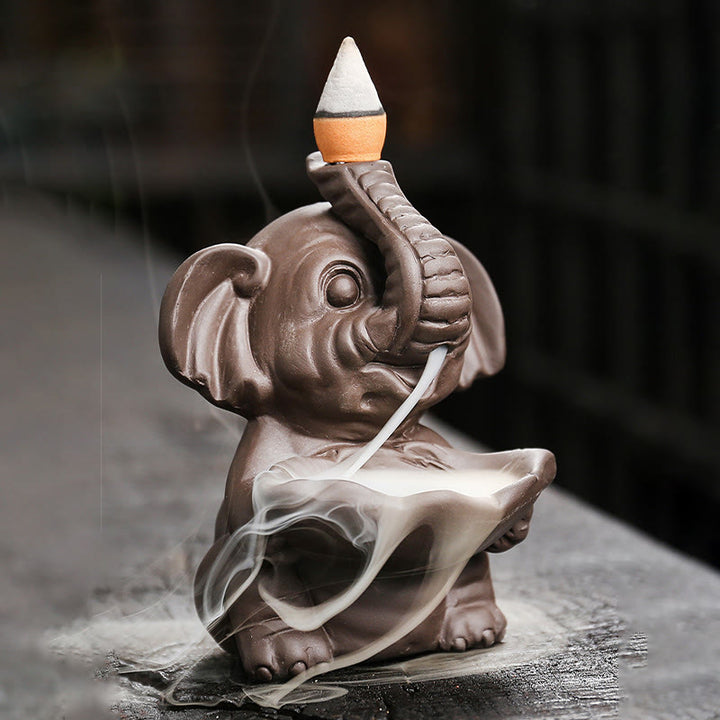Buddha Stones Mały Słoń Trzymający Liść Fioletowa Glina Fontanna Dymna Z Przepływem Wstecznym Uzdrawiająca Kadzielnica Dekoracja - image 1