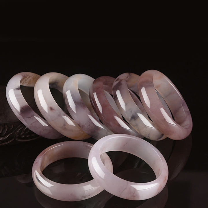 Bransoletka ochronna z fioletowym jadeitem i Buddha Stones
