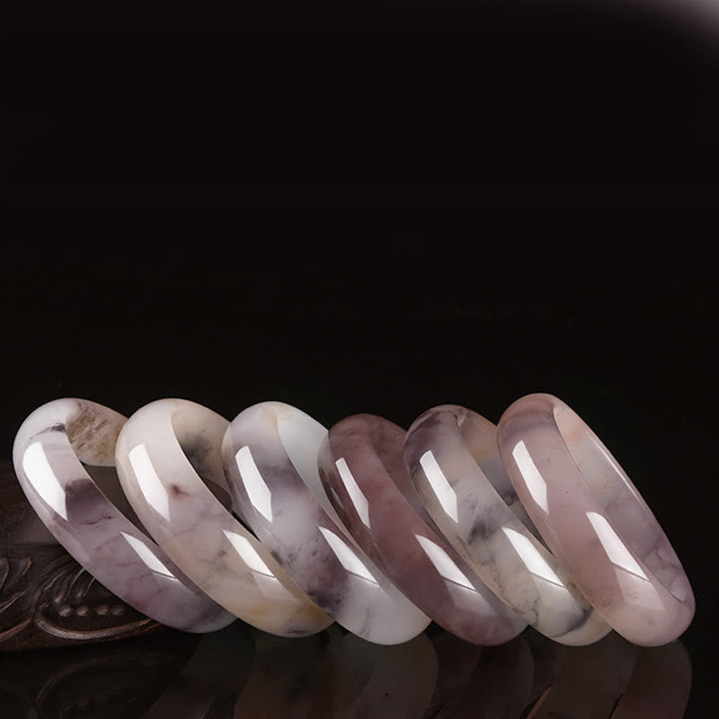 Bransoletka ochronna z fioletowym jadeitem i Buddha Stones