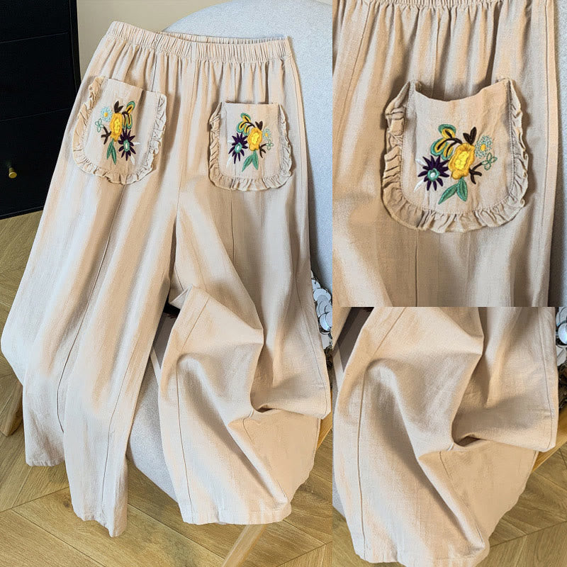 Damskie spodnie lniane z szerokimi nogawkami i kieszeniami, w beżowym kolorze z haftem i motywem Buddha Stones - image 9