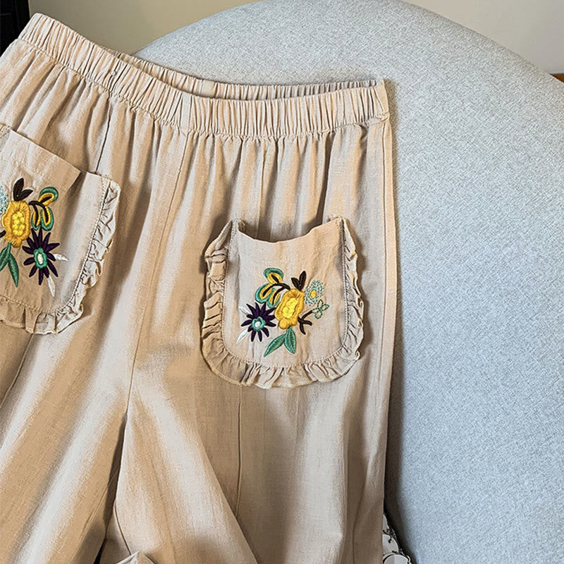 Damskie spodnie lniane z szerokimi nogawkami i kieszeniami, w beżowym kolorze z haftem i motywem Buddha Stones - image 5
