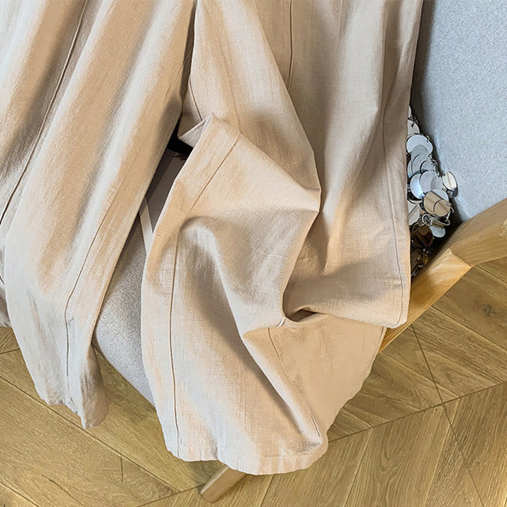 Damskie spodnie lniane z szerokimi nogawkami i kieszeniami, w beżowym kolorze z haftem i motywem Buddha Stones - image 7