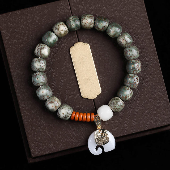 Bransoletka z ręcznie polerowanych Buddha Stones z motywem gwiazdy i księżyca Bodhi, wzorem słonia i wewnętrznym spokojem - Zielone nasiono Bodhi Księżyca Gwiazd i Biały Słoń (obwód nadgarstka: 14-16 cm) - image 15