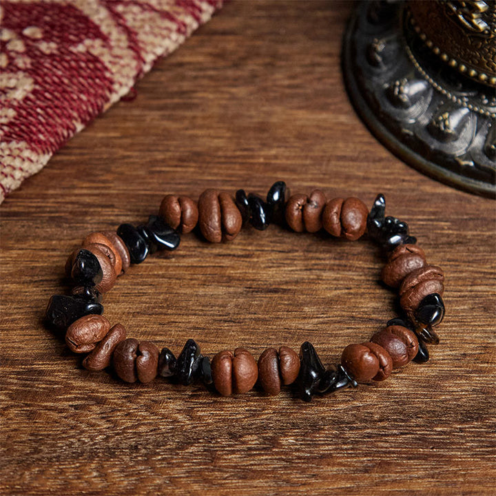 Bransoletka wzmacniająca z naturalnych ziaren kawy Buddha Stones z czarnego obsydianu i kwarcu rutylowego - Czarny obsydian (obwód nadgarstka: 17,5 cm) - image 1