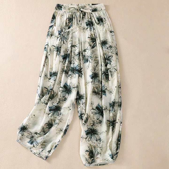 Damskie spodnie z poliestru o długości 7-8 z kieszeniami, z nadrukiem kwiatowym i Buddha Stones - SeaGreen - US12, UK/AU16, EU44 (2XL) - image 0