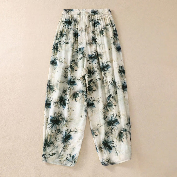 Damskie spodnie z poliestru o długości 7-8 z kieszeniami, z nadrukiem kwiatowym i Buddha Stones - image 1