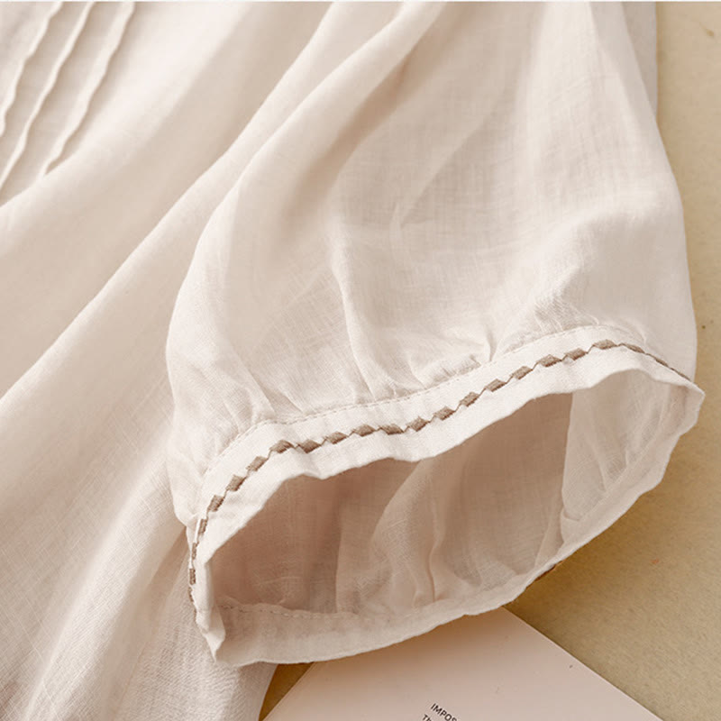 Damska bawełniana lniana koszulka z krótkim rękawem i haftowanymi Buddha Stones , z okrągłym dekoltem i plisami - image 7