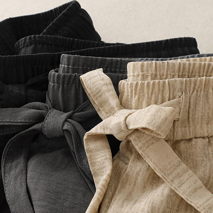 Damskie bawełniane spodnie z szerokimi nogawkami i kieszeniami, w stylu casual, letnie, sznurowane, z motywem Buddha Stones