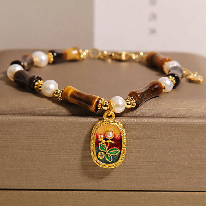 Bransoletka wzmacniająca z naturalnych pereł bambusowych i tygrysiego oka z Buddha Stones - Tygrysie oko (obwód nadgarstka: 18-22 cm) - image 1