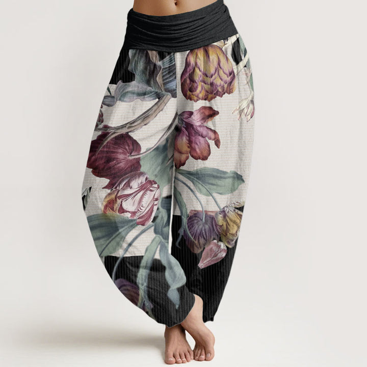 Damskie spodnie haremowe z elastyczną talią, z motywem tulipanów i zielonych liści, z kamieniami Buddha Stones - Czarny - US22, UK/AU26, EU54 (6XL) - image 0