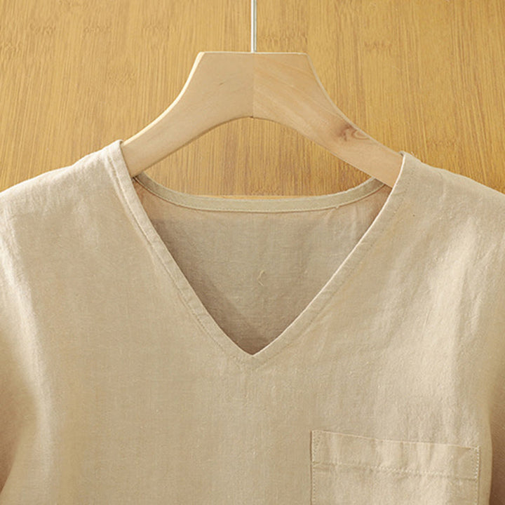 Koszulka damska z bawełny i lnu z dekoltem w serek i kieszenią "Buddha Stones" w swobodnym, gładkim stylu - image 2