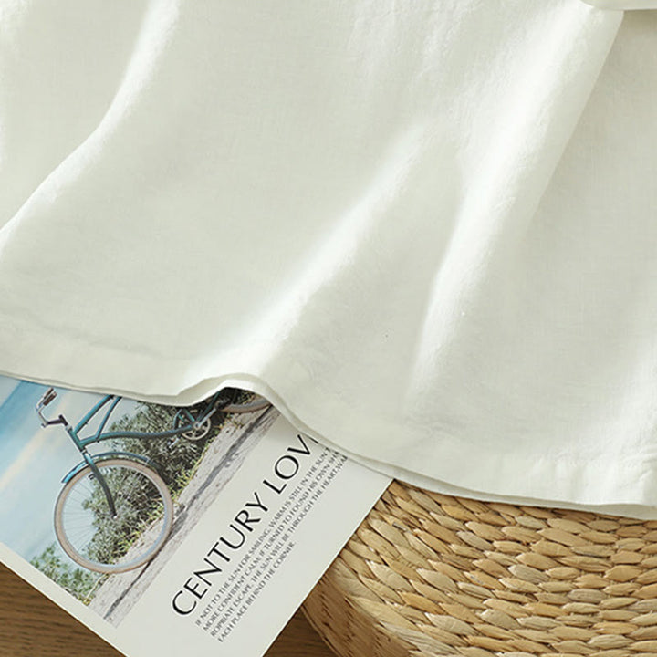 Koszulka damska z bawełny i lnu z dekoltem w serek i kieszenią "Buddha Stones" w swobodnym, gładkim stylu - image 13