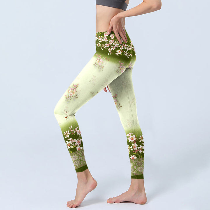 Damskie legginsy do jogi z nadrukiem "Buddha Stones" w różowe kwiaty i zielone liście - image 3